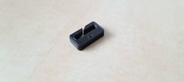 Spare flashlight strap holder
